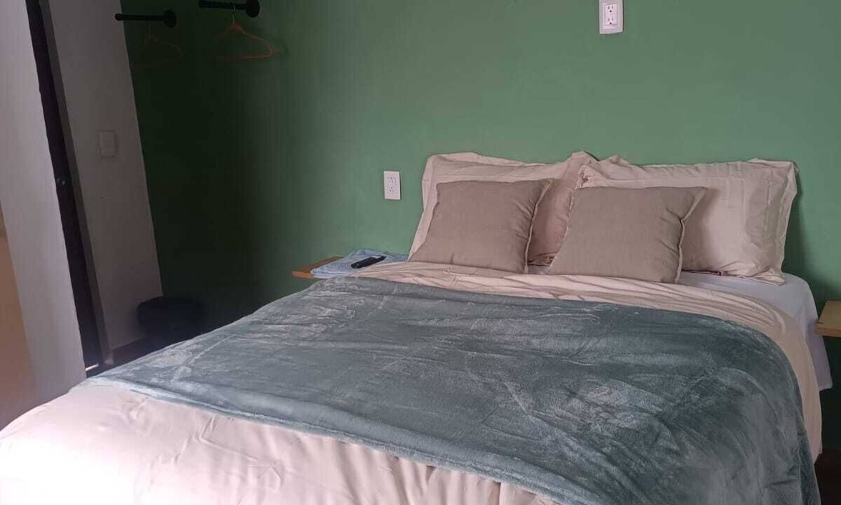 Queretaro Apartment | Comfortable room with private bathroom next to plaza candiles in Querétaro