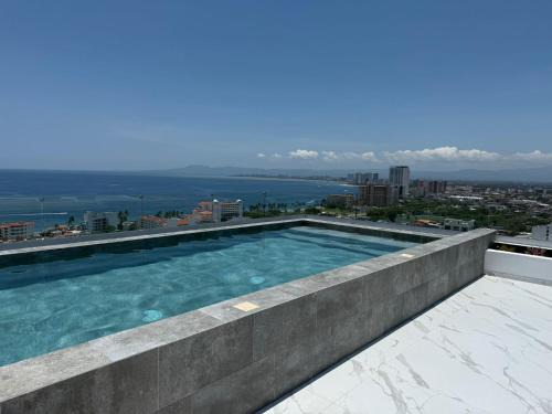 Colonia 5 de Diciembre Apartment | Modern 2BR Ocean view - Walk to Beach and Downtown