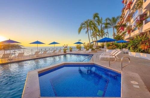 South Shore Hotel Area Condo | Beachfront Luxury | Spacious 2BR on Sandy Swimmable Bay | Ocean Views & Sunsets