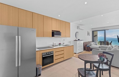 Flamingos Condo | Heated pool + pool bar + unbelievable view!