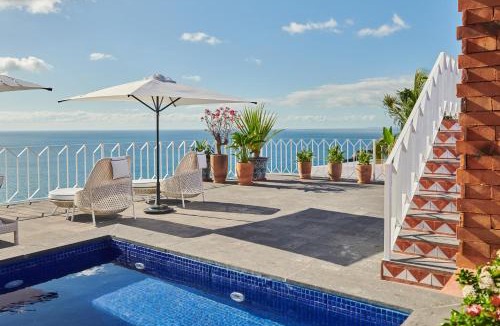 Conchas Chinas Hotel | Hotel Boutique Luxury Patio Azul