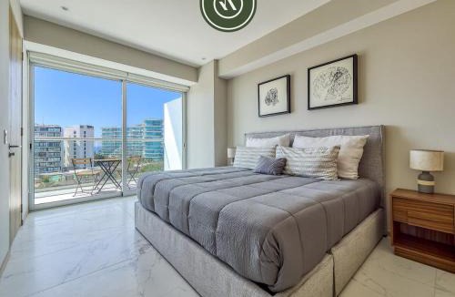 Flamingos House | Luxury 3 BR Condo - Beach Access 1 Block Away
