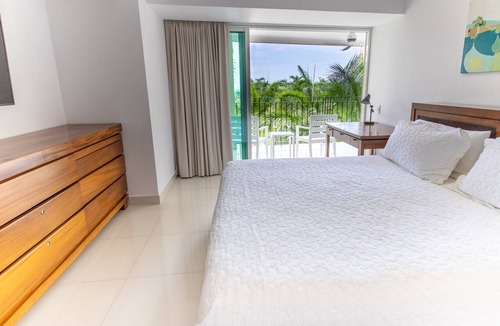 Marina Vallarta Condo | Luxury beachfront condo in Porto Fino, bonus studio, private beach, pool.
