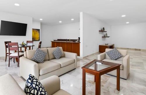 Conchas Chinas House | Modern hillside suite with balcony, city view, pools, gym & full kitchen