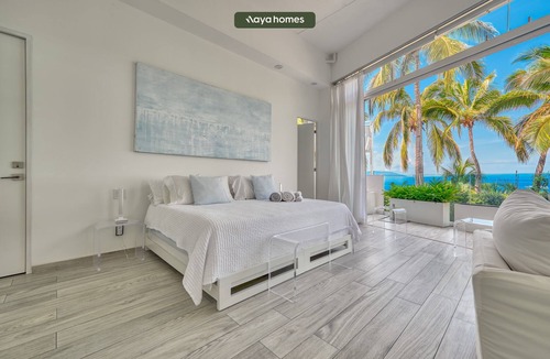 Conchas Chinas Condo | Ocean Front 3 Bedroom/3 bath modern condo with huge floor to glass doors