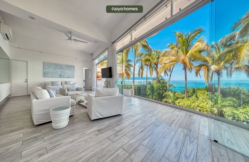 Conchas Chinas Condo | Ocean Front 3 Bedroom/3 bath modern condo with huge floor to glass doors