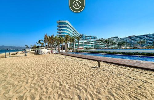 Flamingos House | Oceanview 2 BR Condo - Beachclub - Pool - Ocean