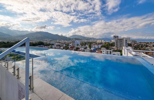 Diaz Ordaz Condo | Puerto Vallarta Palm Retreat
