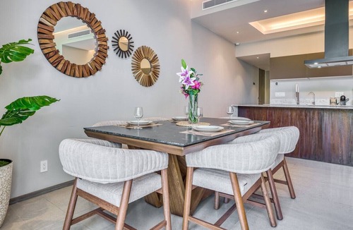 Flamingos Condo | Serene Garden-View retreat at Peninsula