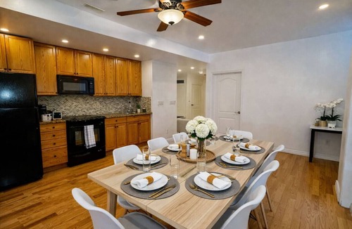 Brampton House | Sleeps 20 · Three Private Living Spaces · Heated Pool & Gazebo Lounge · EV Charging
