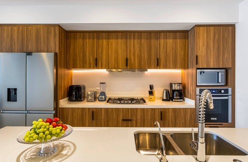 Las Glorias Apartment | Stylish Beachfront 2BR | Balcony Sunsets & Pools