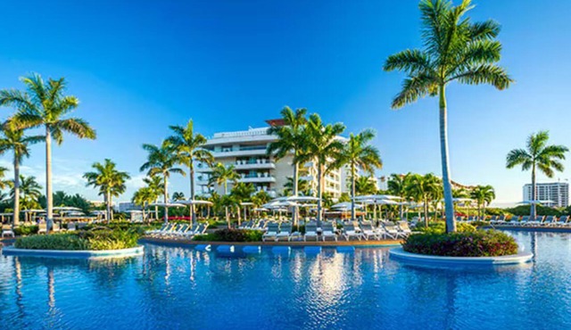 4 bedroom villa spanning entire floor. Private elevator, gourmet kitchen, butler