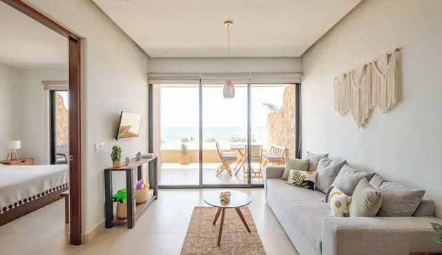 Excellent beachfront apartment with pool.