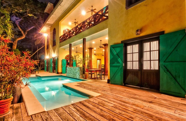 Riverfront Retreat with Balcony, WiFi, Partial AC, Shared Pool in San Ignacio