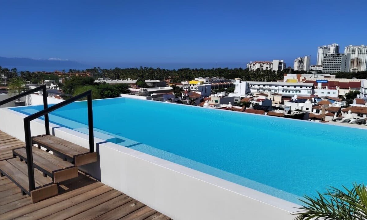 Diaz Ordaz Condo | Versalles Fab New Modern Spacious Condo, Veiws, Walk to the Beach, Rooftop Pool