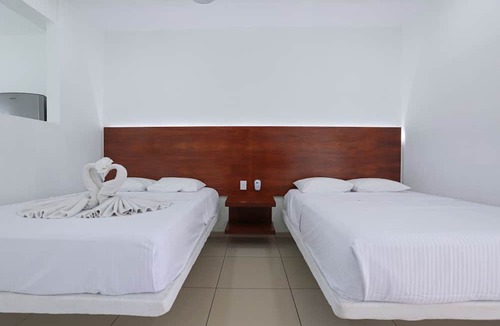 Rincon de Guayabitos Hotel | Hotel Rega Suites Guayabitos - Family & Kitchen
