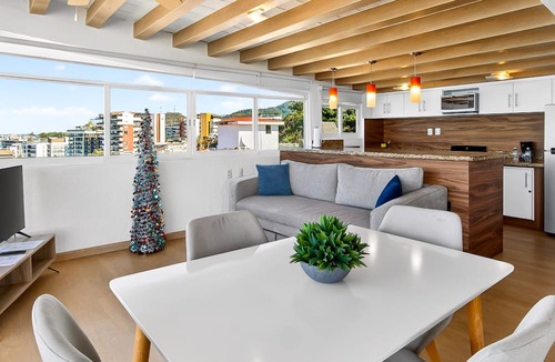 Amapas Apartment | Stylish Coastal Condo With Pool, Private Balcony & Stunning Ocean Views