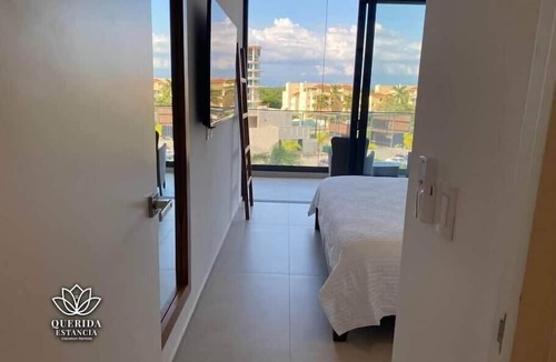 Flamingos Apartment | Beautiful Aria Ocean 401 QueridaEstancia