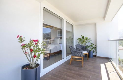 Las Glorias Condo | Upscale Corner Unit w/Large Wrap Around Balcony & Pools