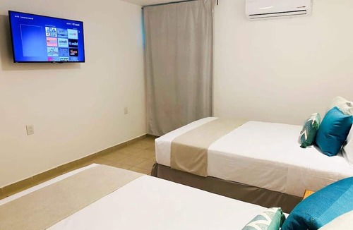 Fluvial Vallarta Apartment | Tropical Lush Gardens, Great Pools & Location