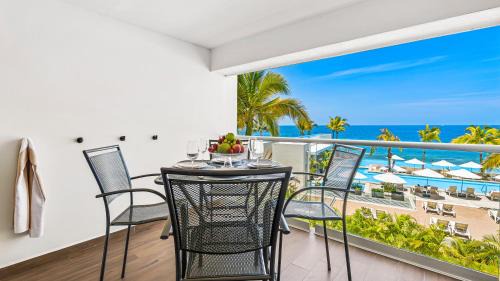 Las Glorias Apartment | Gorgeous 1BR Condo with Pools & Sea Views