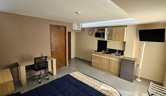 A08 SUPER CITY SUITES AT PLAZA ACEQUIA