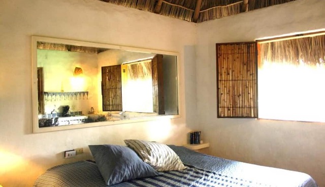 JUNTO AL RIO BEACHFRONT BUNGALOWS