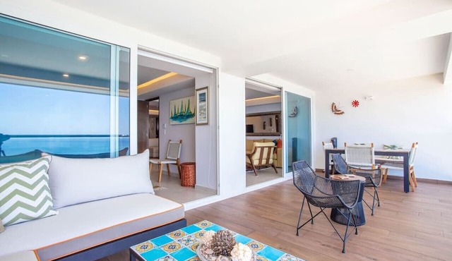 Luxury 2BR Beachfront Escape | Stunning Views from Private Balconies